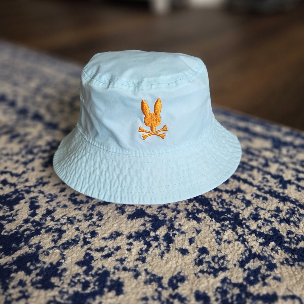 Psycho Bunny Sky Blue Kids Bucket Hat with Orange Emblem